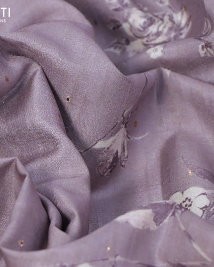Tussar silk saree mild purple shade and cream with allover zari buttas and floral design cross stitched embroidery border