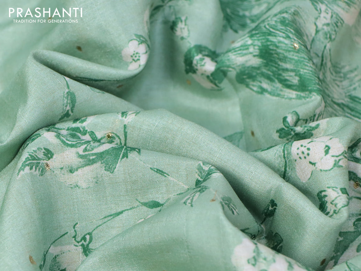 Tussar silk saree pastel green and cream with allover zari buttas and floral design cross stitched embroidery border