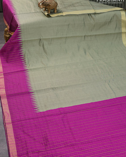 Dupion silk saree pastel green and purple with plain body and temple design zari woven border