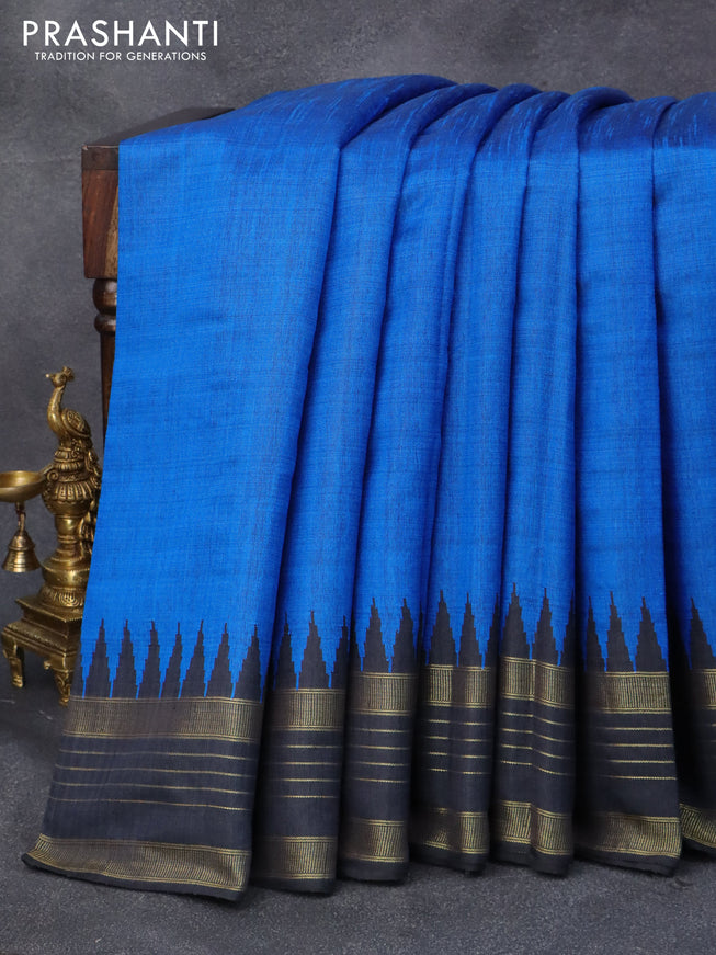 Dupion silk saree cs blue and black with plain body and temple design zari woven border