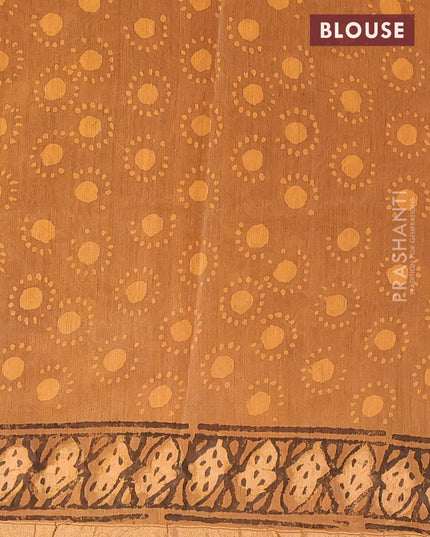 Chanderi bagru saree dark sandal with allover prints and zari woven border