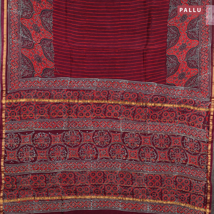 Chanderi bagru saree maroon with allover prints and zari woven border