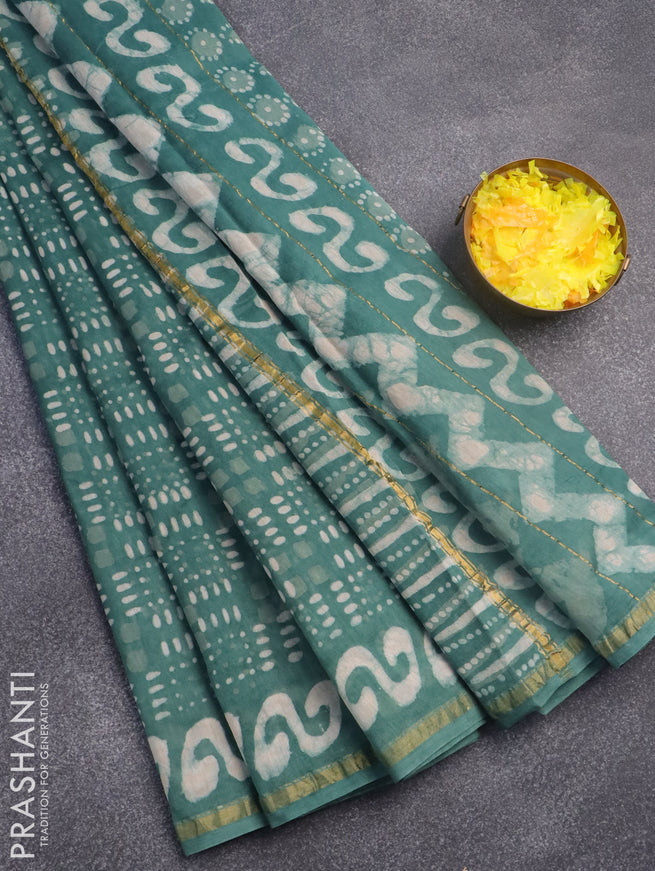 Chanderi bagru saree green shade with allover prints and zari woven border