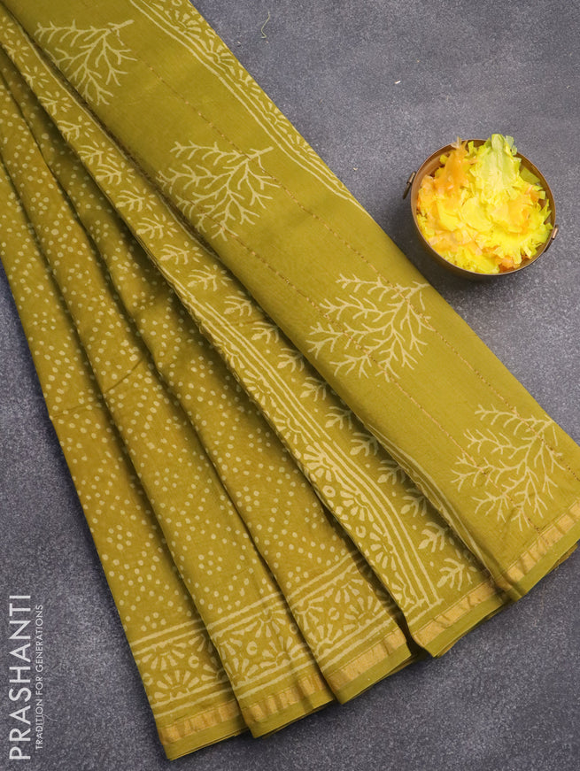 Chanderi bagru saree mehendi green with allover prints and zari woven border