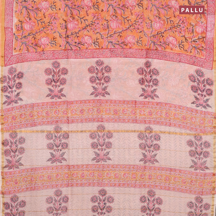 Chanderi bagru saree peach orange with allover floral prints and zari woven border