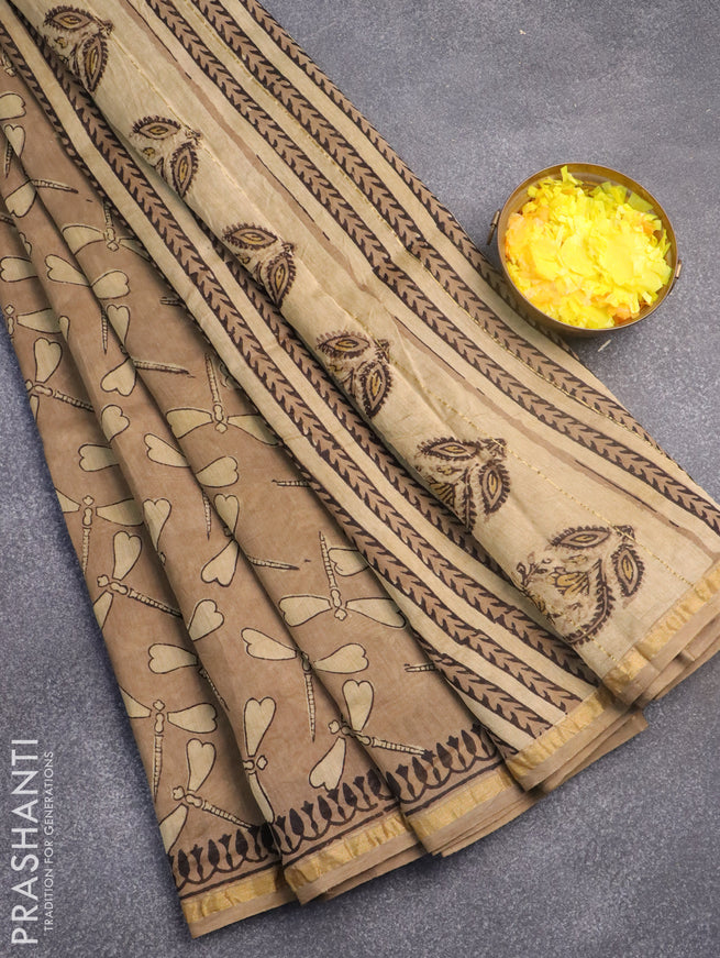 Chanderi bagru saree chikku shade with allover prints and zari woven border