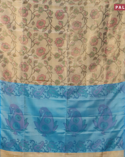 Banarasi semi tussar saree sandal and light blue with allover ikat weaves and silver zari woven border