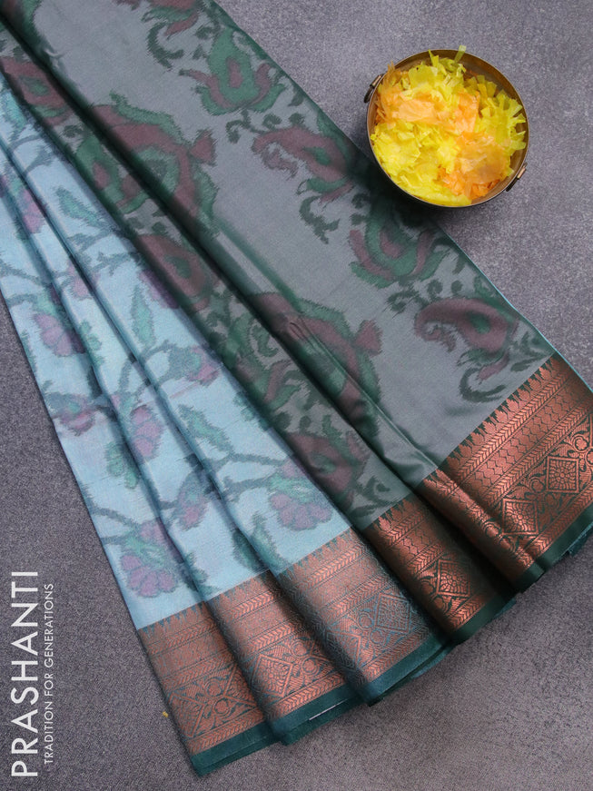 Banarasi semi tussar saree pastel blue and dark green with allover ikat weaves and copper zari woven border