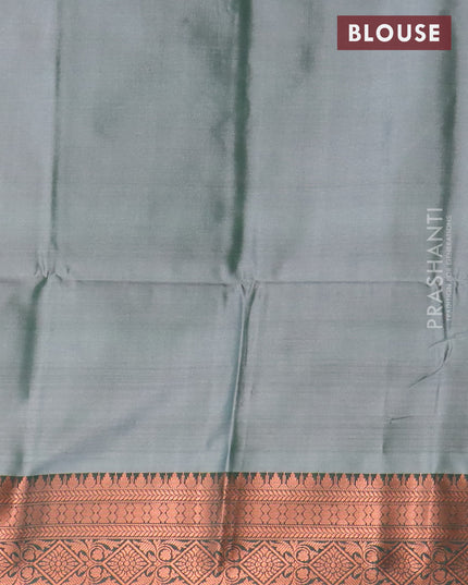 Banarasi semi tussar saree pastel pink and dark green with allover ikat weaves and copper zari woven border