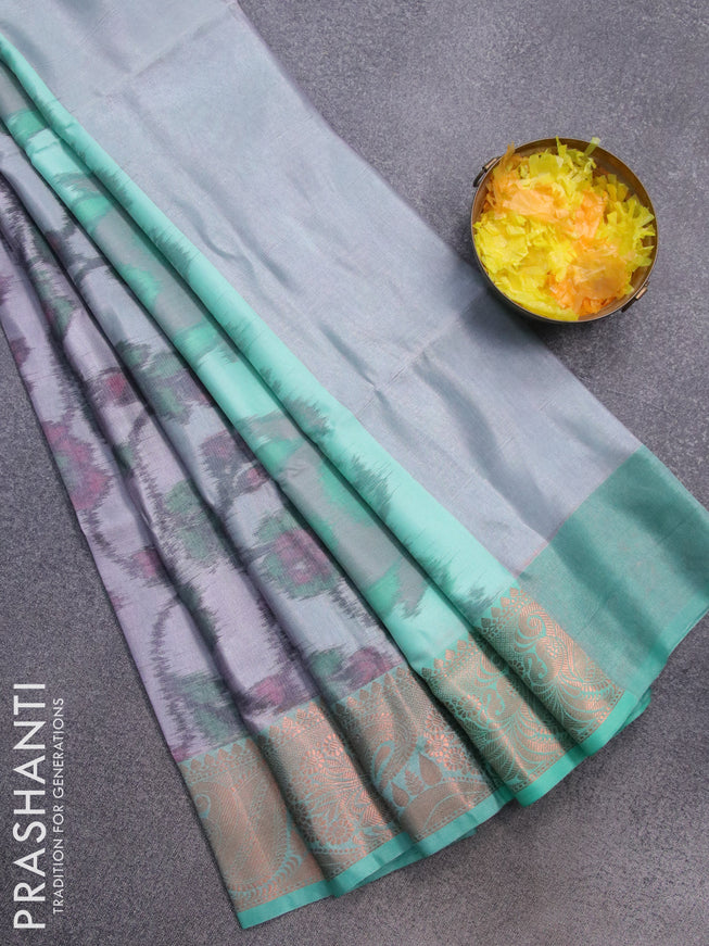Banarasi semi tussar saree pastel grey and teal green with allover ikat weaves and copper zari woven border