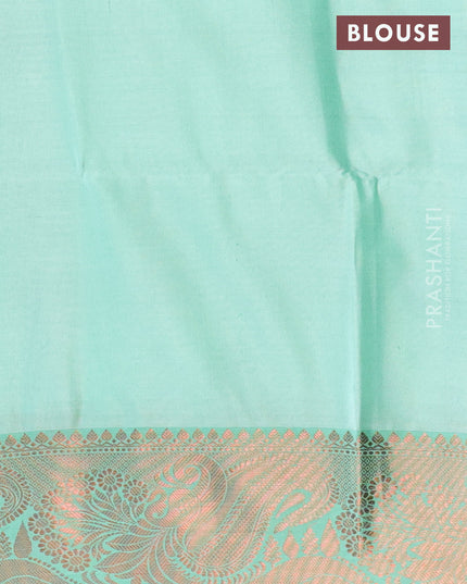 Banarasi semi tussar saree pastel grey and teal green with allover ikat weaves and copper zari woven border