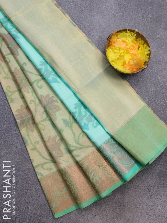 Banarasi semi tussar saree green shade with allover ikat weaves and copper zari woven border