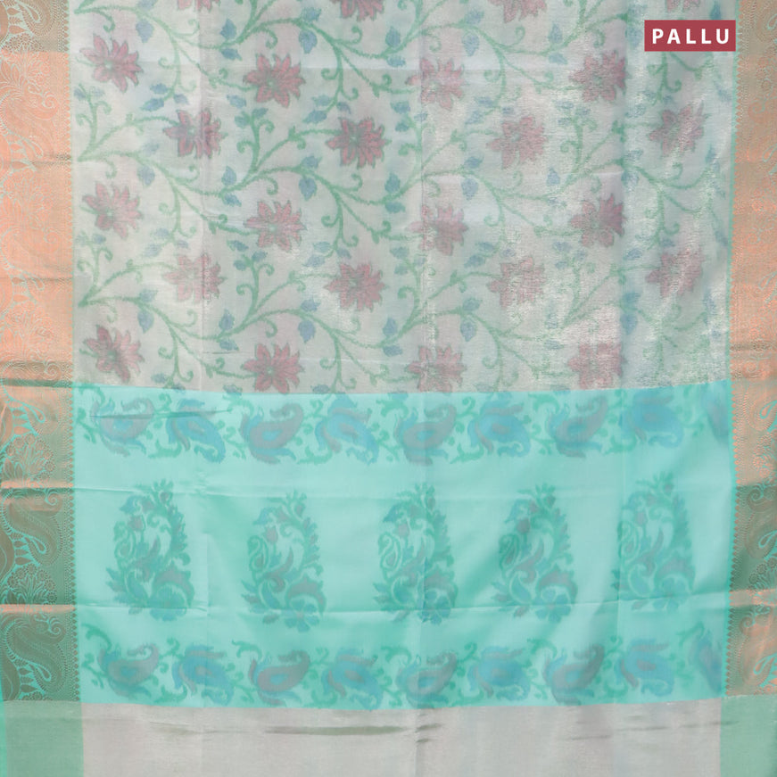 Banarasi semi tussar saree teal green shade with allover ikat weaves and copper zari woven border