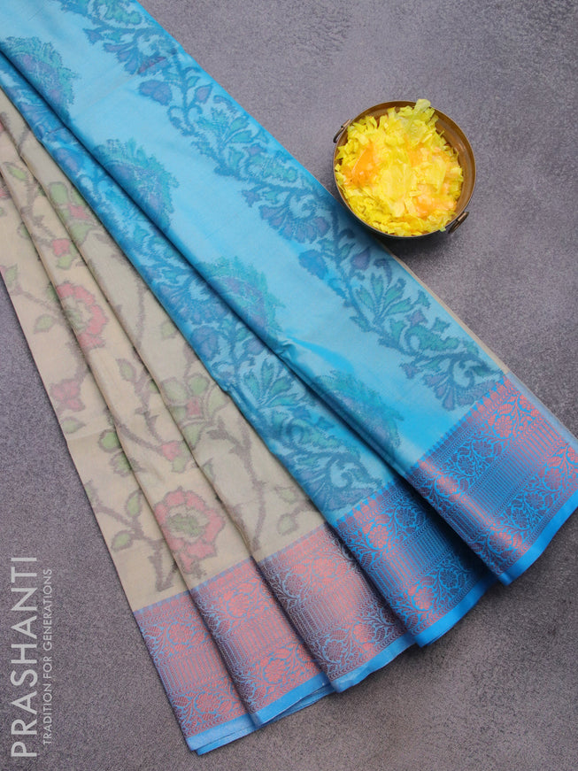 Banarasi semi tussar saree cream and cs blue with allover ikat weaves and copper zari woven border