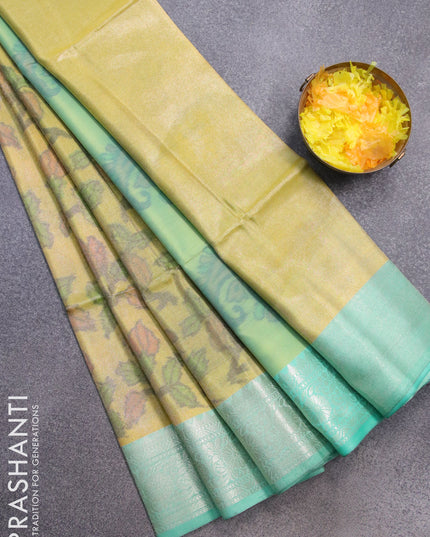 Banarasi semi tussar saree lime yellow and teal green with allover ikat weaves and silver zari woven border