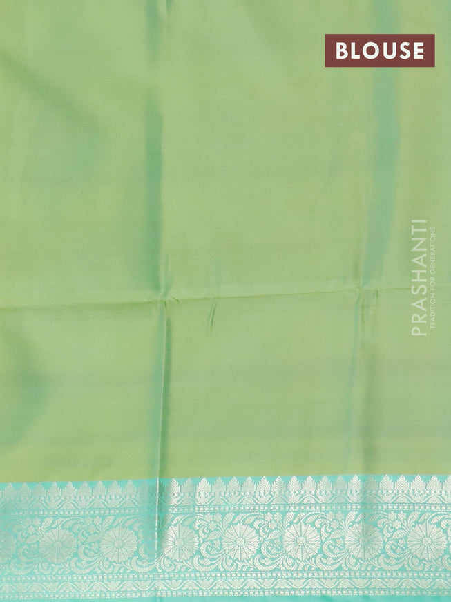 Banarasi semi tussar saree lime yellow and teal green with allover ikat weaves and silver zari woven border