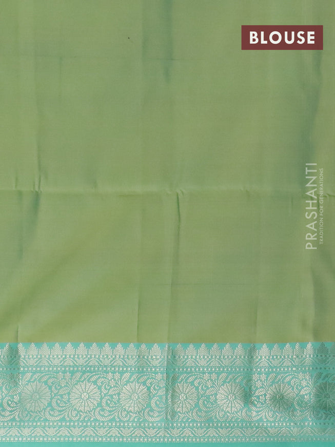 Banarasi semi tussar saree light green and teal blue with allover ikat weaves and silver zari woven border