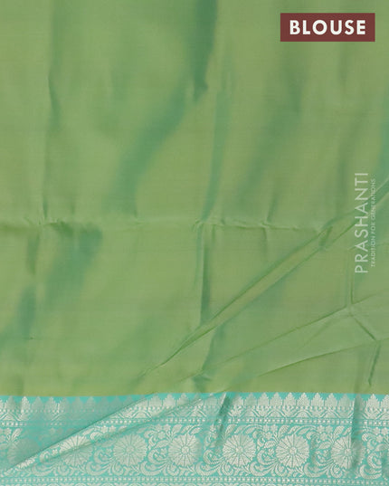 Banarasi semi tussar saree mehendi green and teal green with allover ikat weaves and silver zari woven border