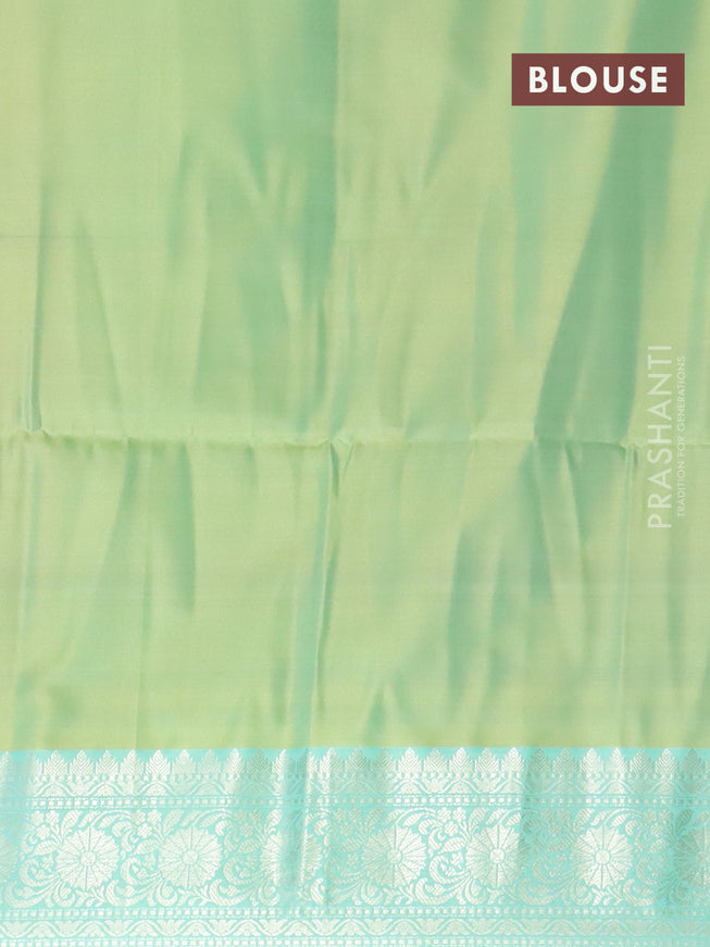 Banarasi semi tussar saree dual shade of yellow and teal green with allover ikat weaves and silver zari woven border