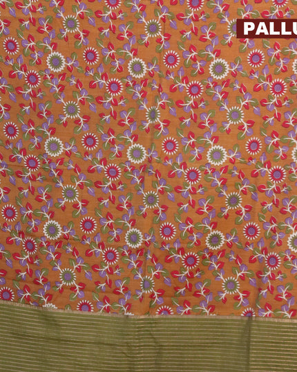 Banarasi cotton saree dark mustard and green shade with allover kalamkari prints and zari woven border