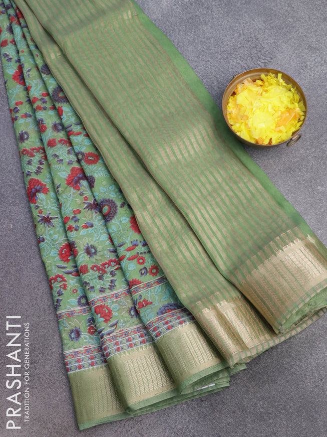 Banarasi cotton saree green shade with allover floral prints and zari woven border