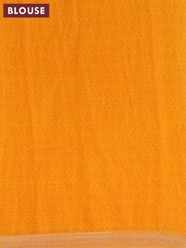 Banarasi cotton saree light blue and mango yellow with allover ikat prints and zari woven border
