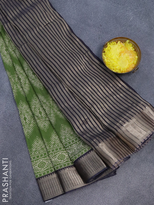 Banarasi cotton saree green and black with allover geometric prints and zari woven border
