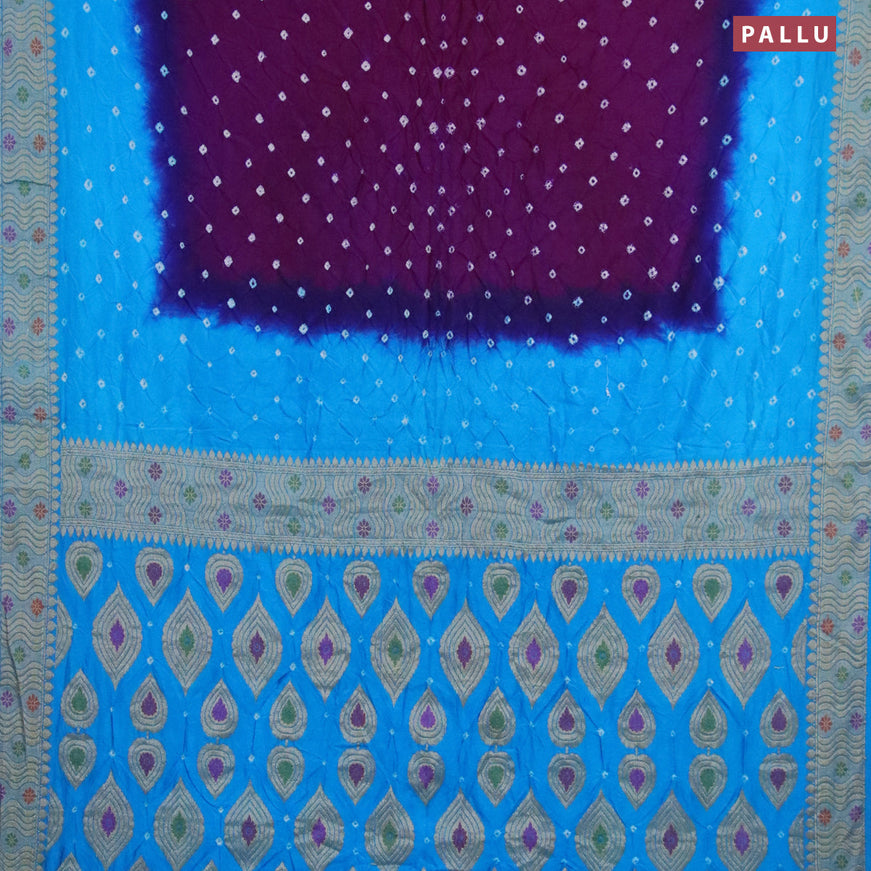 Bandhani saree deep purple and cs blue with allover bandhani prints and banarasi style border