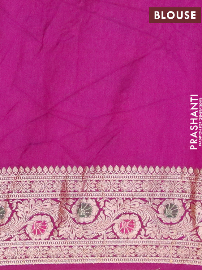 Bandhani saree cs blue and purple with allover bandhani prints and banarasi style border