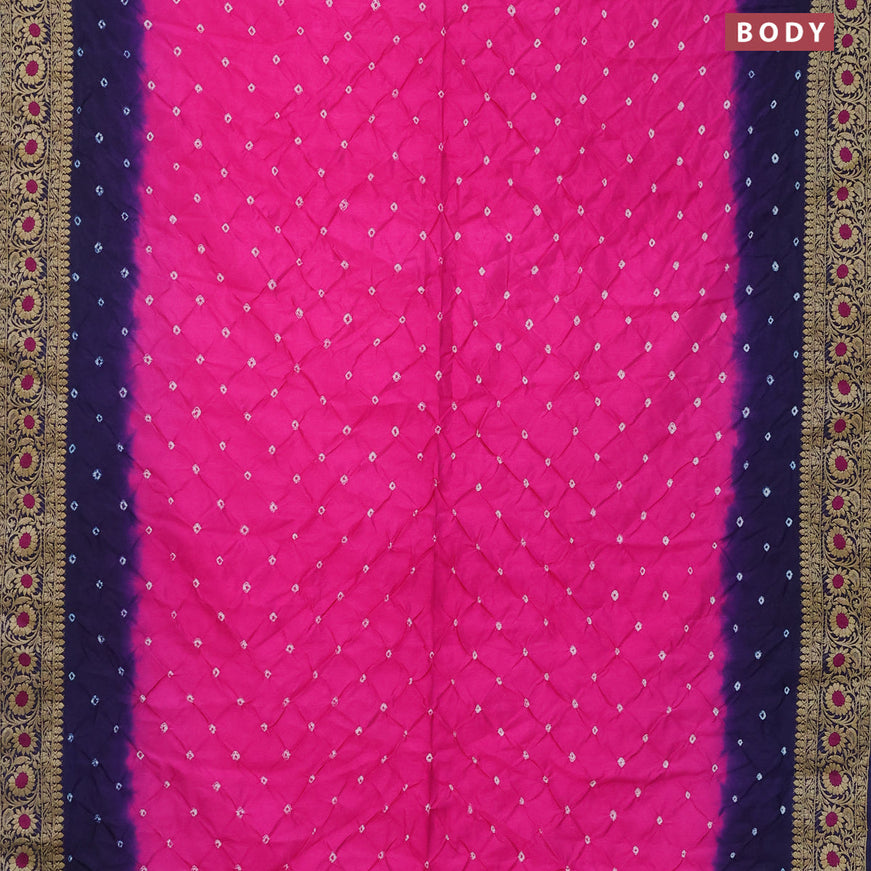 Bandhani saree pink and dark blue with allover bandhani prints and banarasi style border