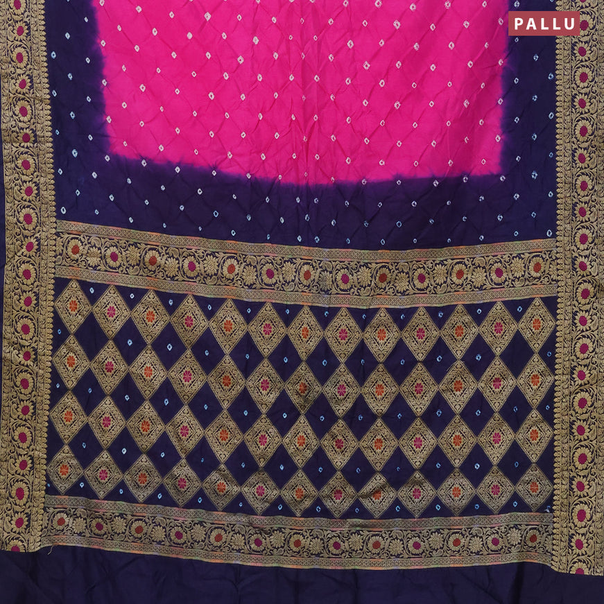 Bandhani saree pink and dark blue with allover bandhani prints and banarasi style border