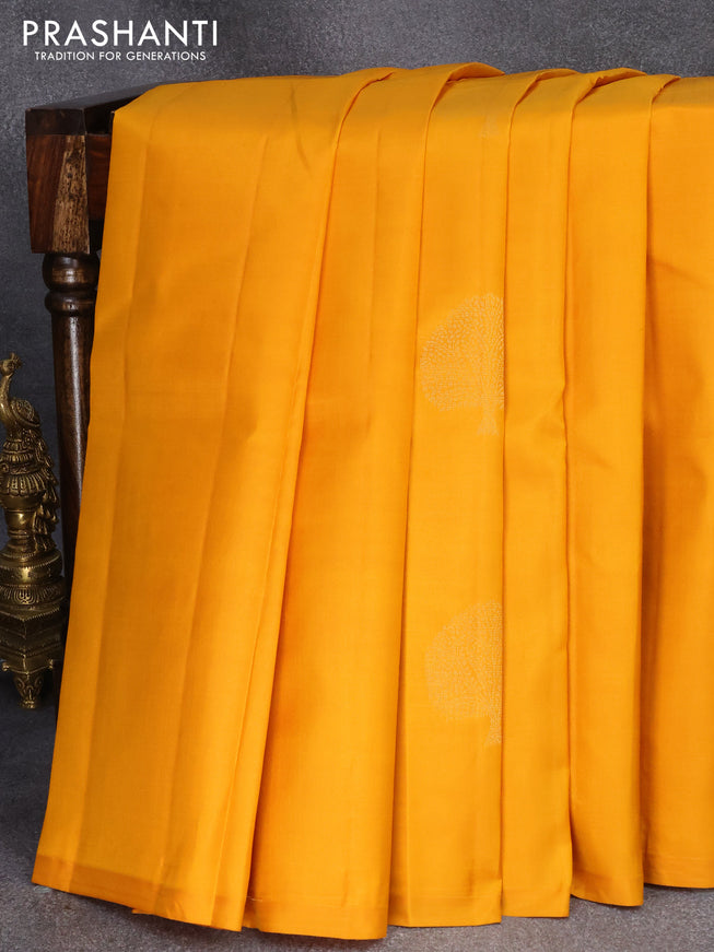 Pure kanjivaram silk saree mustard yellow and pink with zari woven tree buttas in borderless style