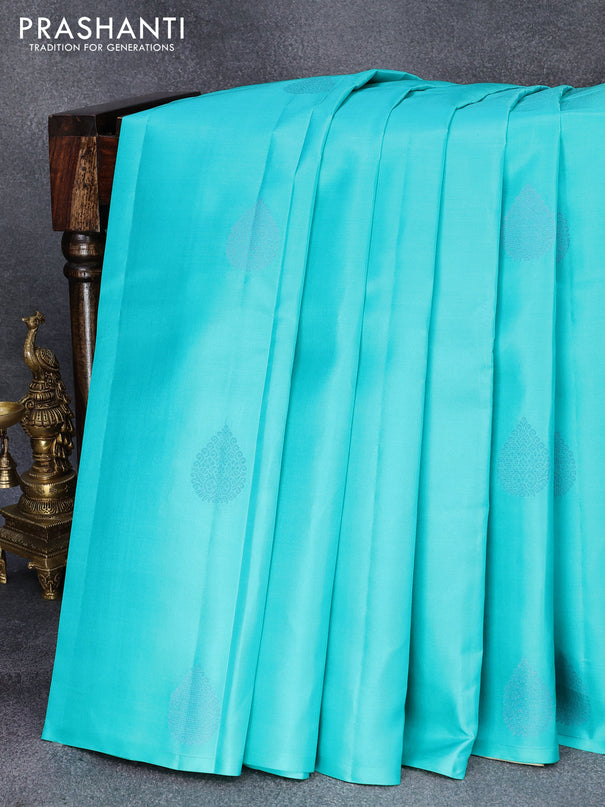 Pure kanjivaram silk saree teal blue and cream with zari woven buttas in borderless style