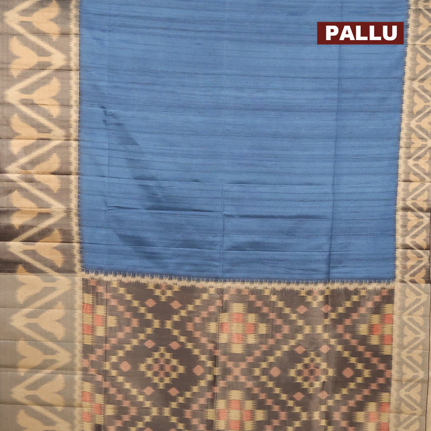 Semi matka saree blue shade and black with plain body and ikat style border