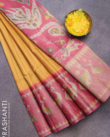 Semi matka saree mustard yellow and pink with plain body and ikat style border