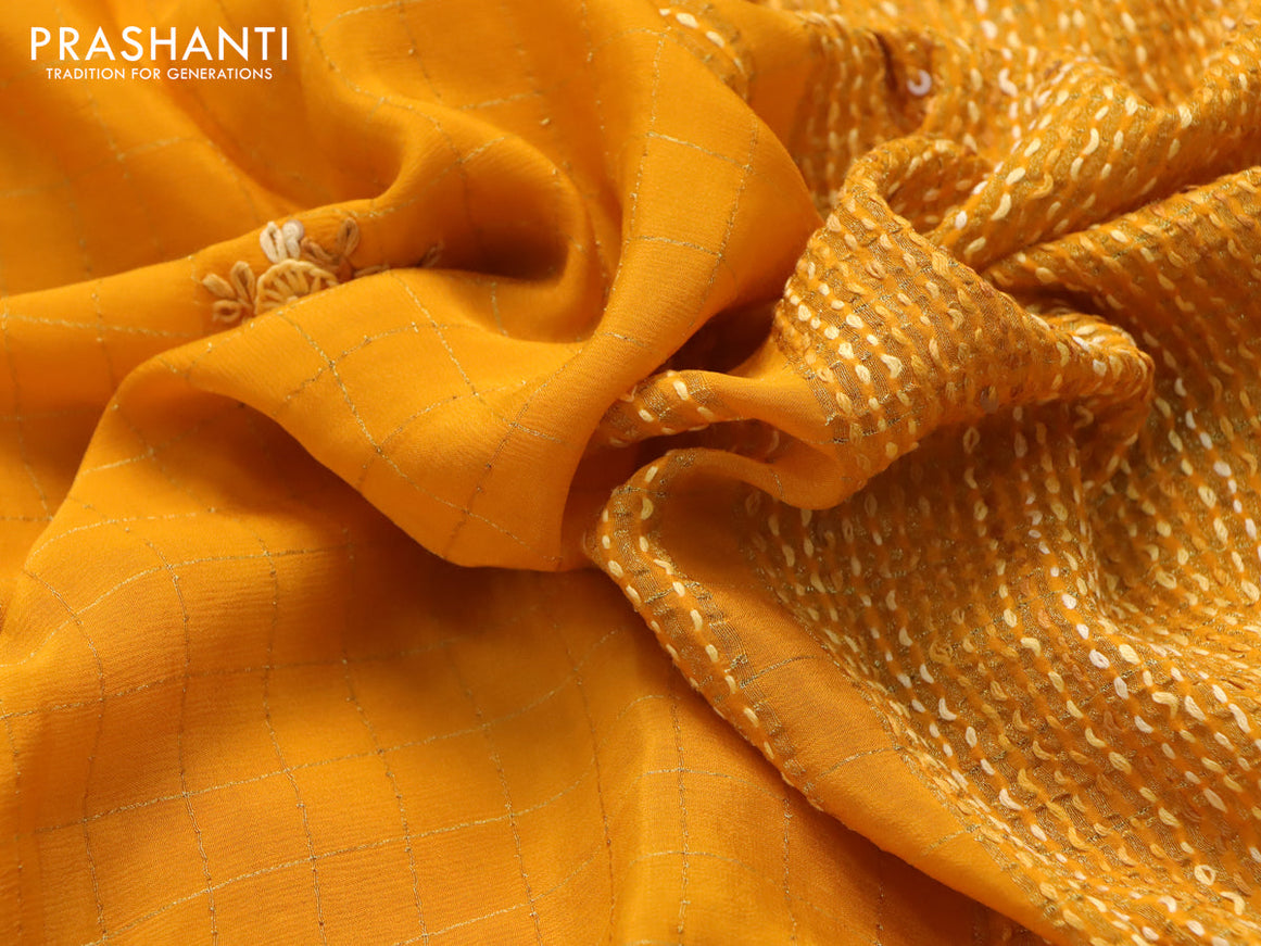 Semi crepe saree mustard yellow with allover zari checked pattern & embroidery work buttas and small zari woven border