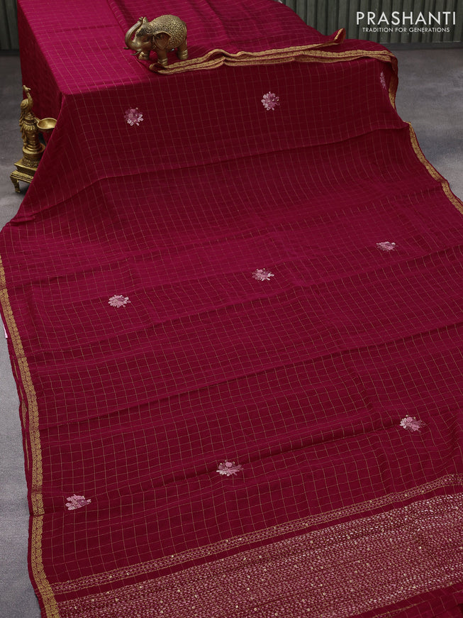 Semi crepe saree dark pink with allover zari checked pattern & embroidery work buttas and small zari woven border