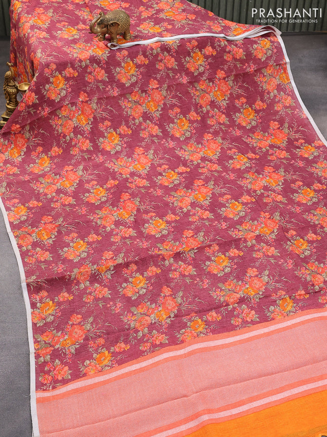 Pure linen saree wine shade with allover floral prints and silver zari woven piping border