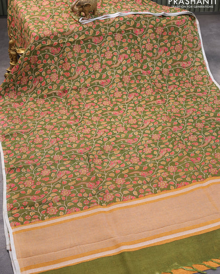 Pure linen saree green with allover kalamkari prints and silver zari woven piping border