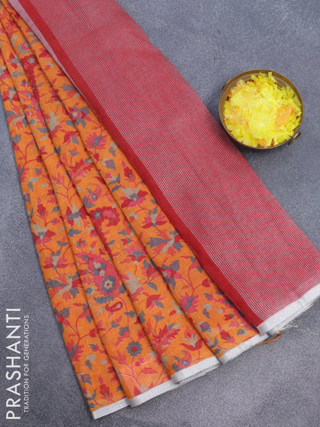 Pure linen saree orange with allover prints and silver zari woven piping border