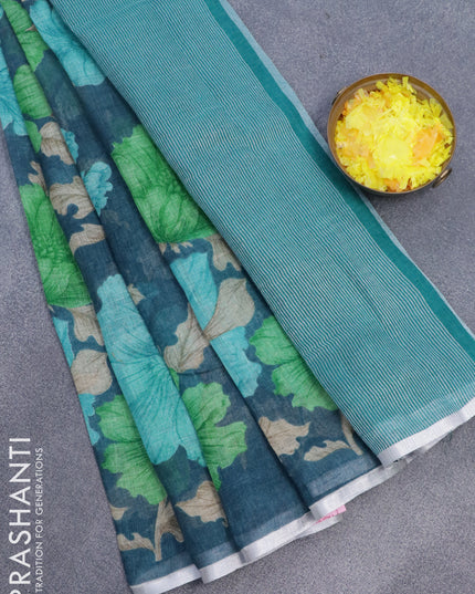 Pure linen saree peacock blue with floral prints and silver zari woven piping border