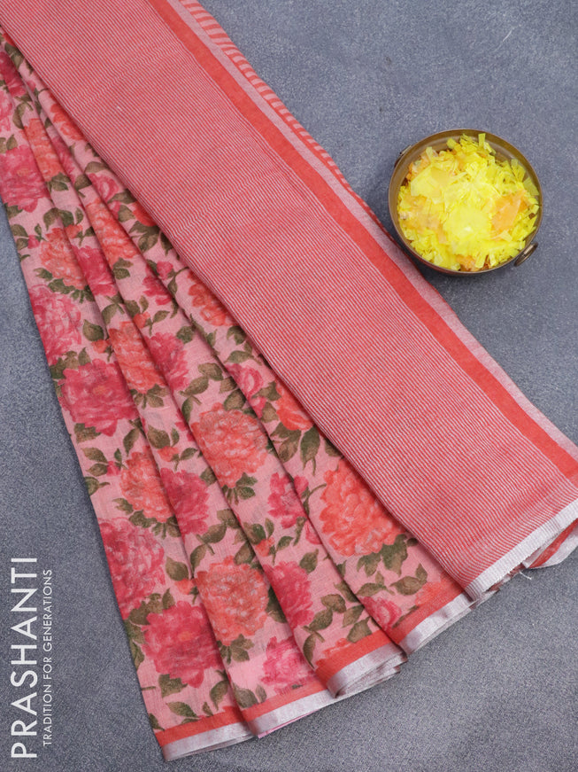 Pure linen saree peach pink and rustic orange with allover floral prints and silver zari woven piping border