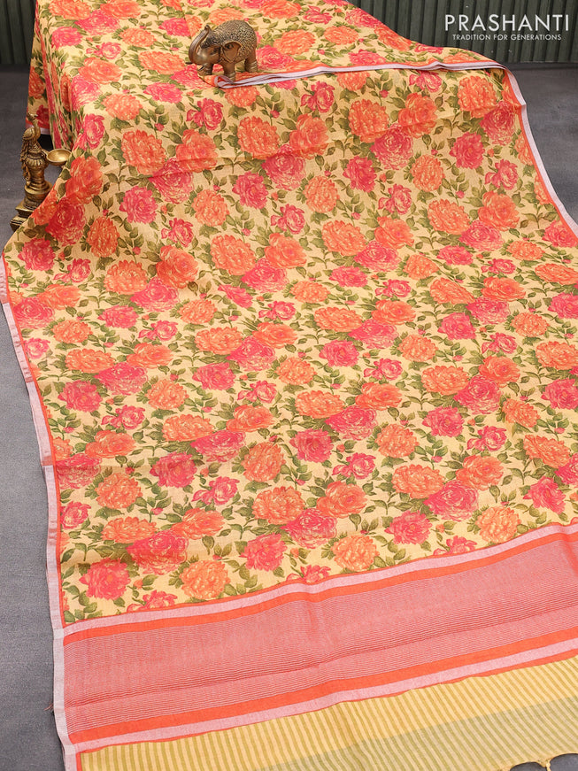 Pure linen saree sandal and rustic orange with allover floral prints and silver zari woven piping border
