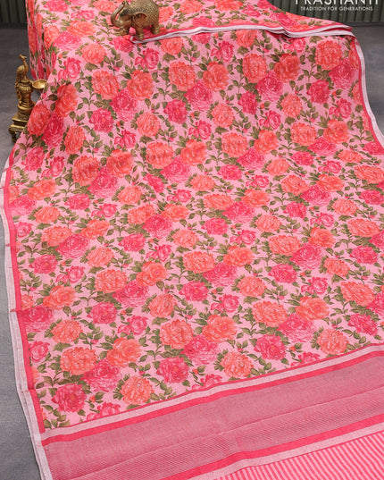 Pure linen saree pink shade with allover floral prints and silver zari woven piping border