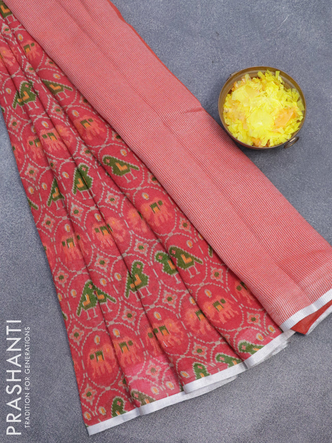 Pure linen saree red shade with allover patola prints and silver zari woven piping border