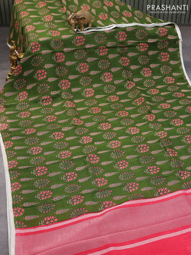 Pure linen saree green with allover butta prints and silver zari woven piping border