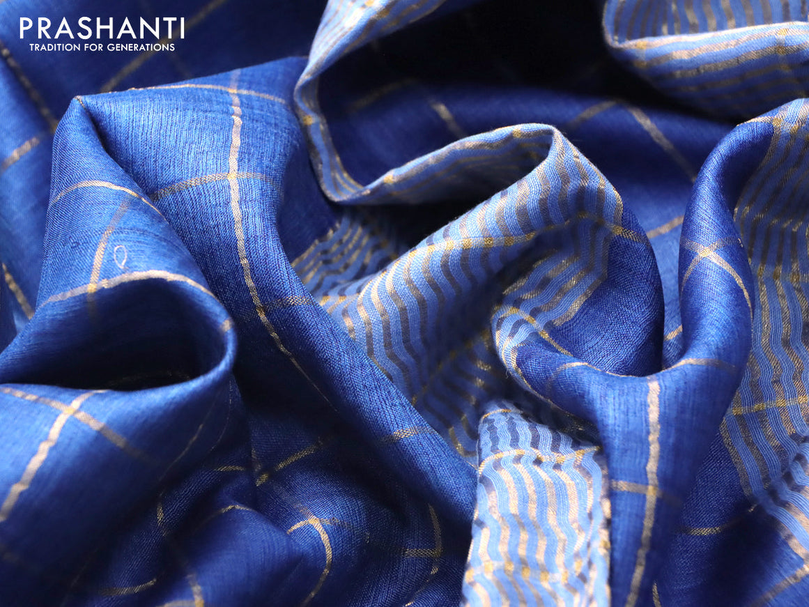 Pure tussar silk saree blue and rustic orange with allover zari checked pattern and zari woven border and Kalamkari printed blouse