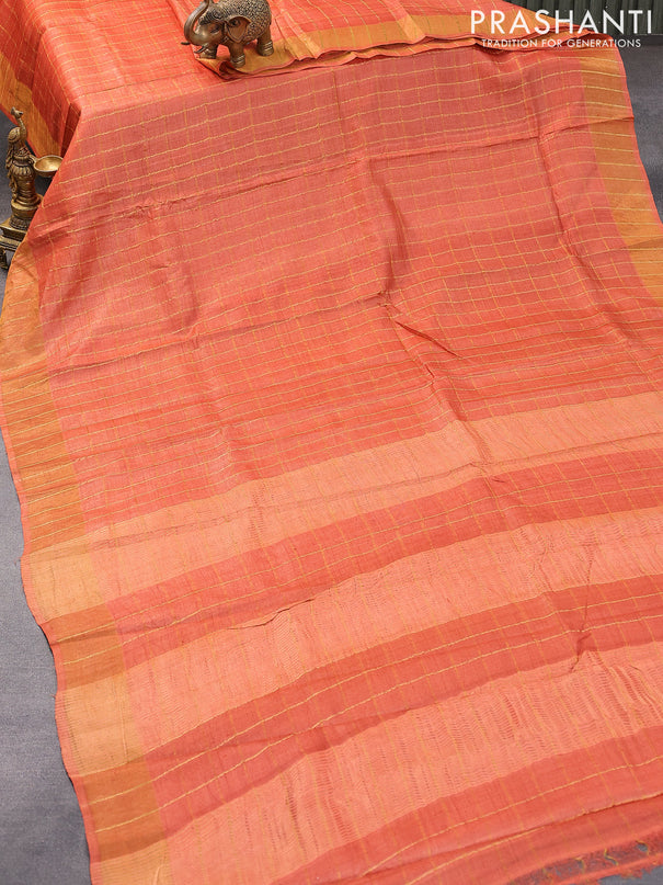 Pure tussar silk saree rustic orange and teal green with allover zari checked pattern and zari woven border and Kalamkari printed blouse