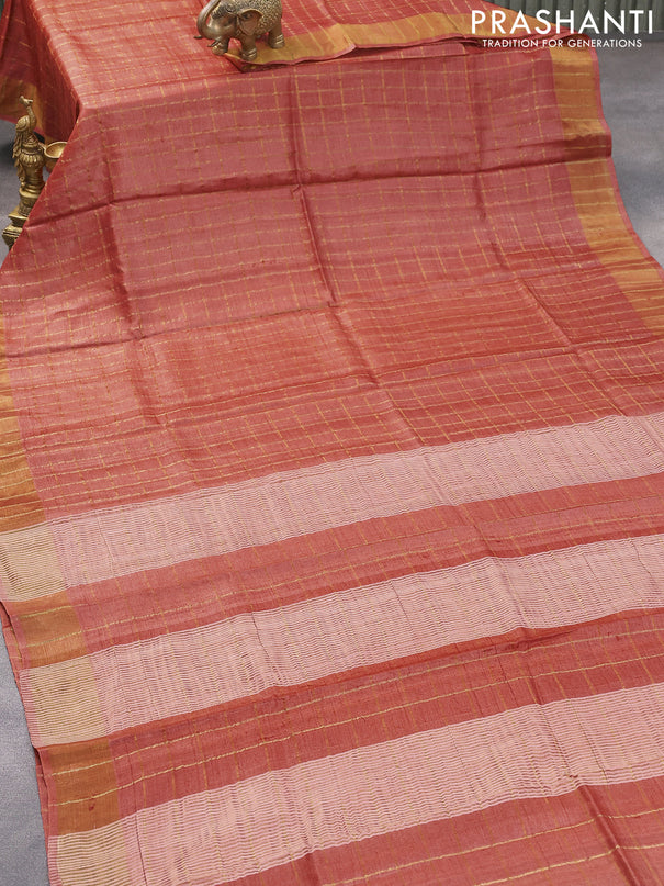Pure tussar silk saree rustic orange and teal green with allover zari checked pattern and zari woven border and Kalamkari printed blouse