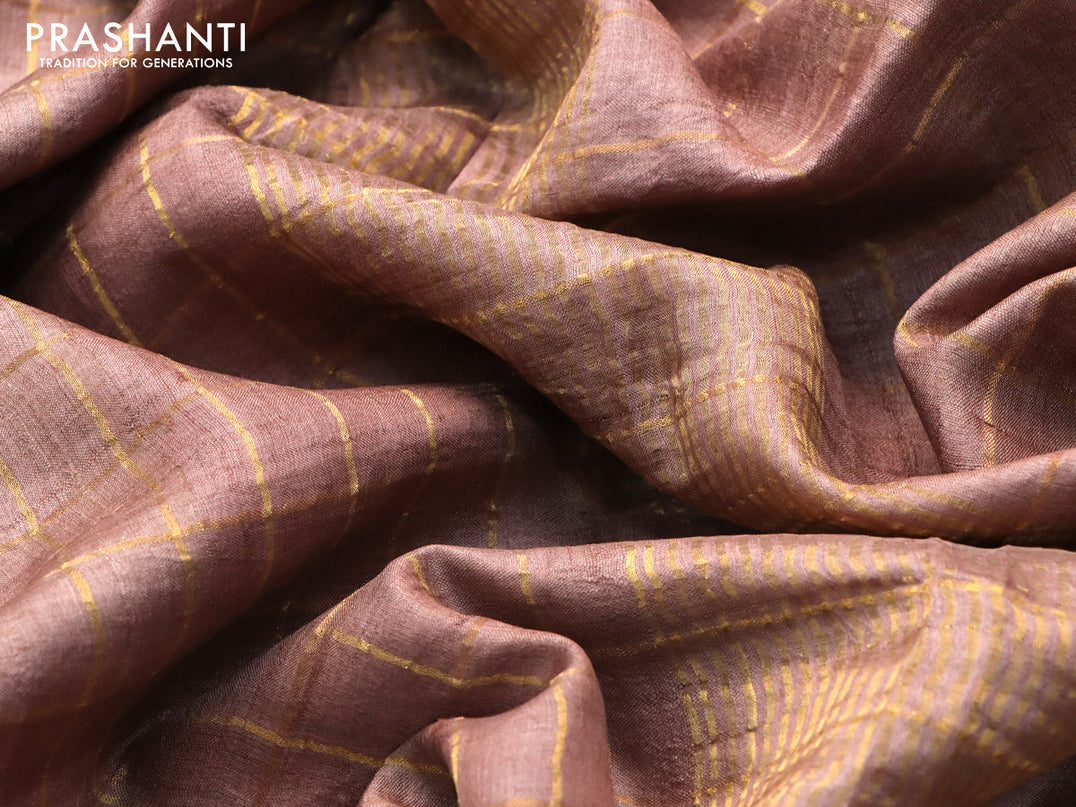 Pure tussar silk saree brown shade and rustic orange with allover zari checked pattern and zari woven border and Kalamkari printed blouse